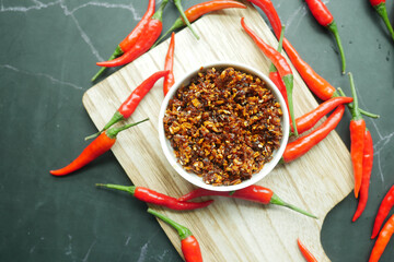 chili and garlic flakes in a container 