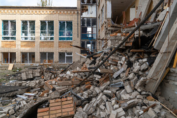 War in Ukraine. Russian invasion of Ukraine. School damaged after shelling. Destruction of...