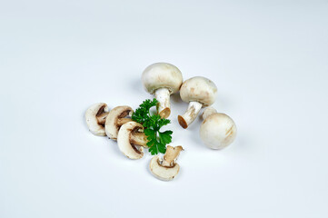 Sliced champignon mushrooms, white background