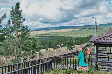 Wooden footpath for ritual detour around datsan. Buddhist datsan Rinpoche Bagsha, Ulan-Ude, Russia.