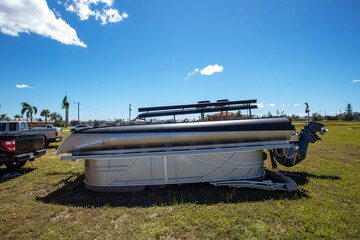 Flipped pontoon boat after hurricane Ian. 