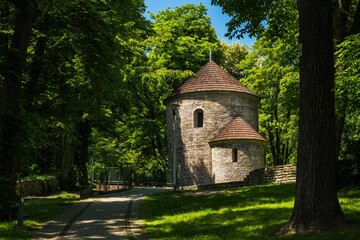 Obraz premium Medieval rotunda at Castle Hill with an alley and trees around in Cieszyn, Silesia, Poland