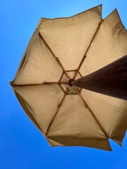 Beach umbrella against blue sky