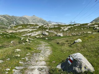 Hiking trails or mountaineering routes in the autumn Swiss Alpine environment and in the St....