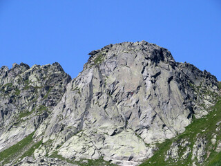 Rocks and stones in the summer Swiss Alpine environment and in the St. Gotthard pass (Gotthardpass) mountain area, Airolo - Canton of Ticino (Tessin), Switzerland (Schweiz)