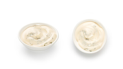 Mayonnaise, mayo, white cream sauce in a white little bowl, gravy boat isolated on white background with clipping path, cut out.