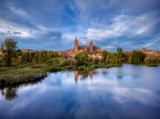 Fototapeta premium View of the Salamanca cathedral reflected in the Tormes river