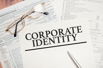 CORPORATE IDENTITY text on paper and tax forms