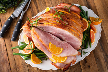 Christmas honey glazed ham served on a plate