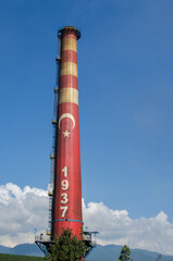 chimney of a factory with sky