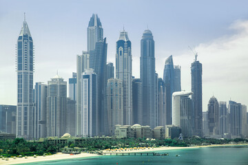 Naklejka premium Dubai Marina skyscrapers, complex of residential and office buildings with beautiful white sand beaches. Dubai, UAE