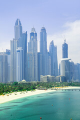 Obraz premium Dubai Marina skyscrapers, complex of residential and office buildings with beautiful white sand beaches. Dubai, UAE