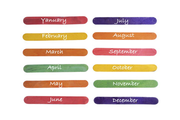 Obraz premium the months of the year written on colored wooden palettes
