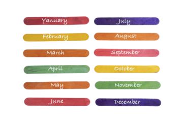 the months of the year written on colored wooden palettes