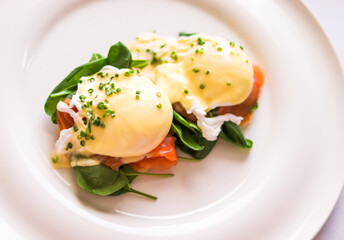 Luxury breakfast, brunch and food recipe, poached eggs with salmon and greens on gluten-free toast...