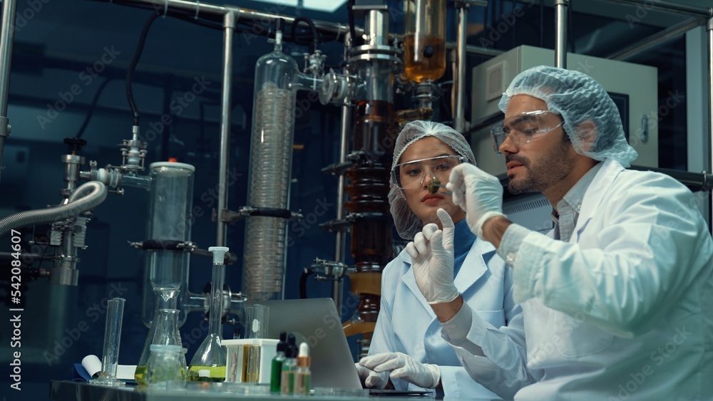 Poster two scientist in professional uniform working in laboratory for chemical and biomedical experiment