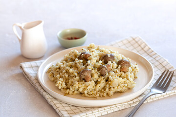 Portion of mushrooms, shallot and celery risotto