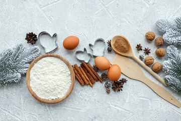 Ingredients for cooking christmas baking. Flour, eggs, brown sugar and spices. Top view with copy space