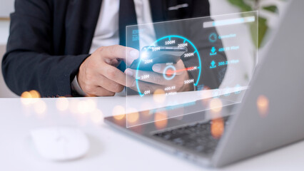 Fast internet connection with Metaverse technology concept, Hand holding smartphone and Virtual screen of Internet speed measurement, Internet and technology concept, 5G Hi speed internet concept