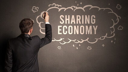 businessman drawing a cloud with inscription
