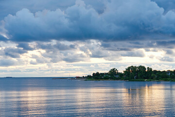Soft sunset over ocean. sunset in cloudy day over baltic sea. Beautiful sunset