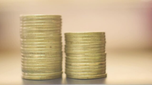 Stop motion footage coin decrease and increase business concept.
