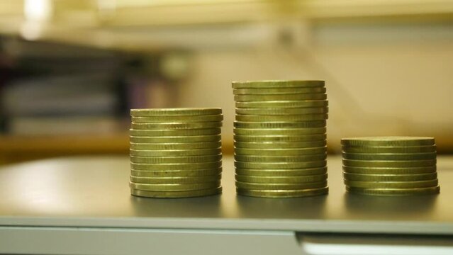 Stop motion footage coin decrease and increase business concept.