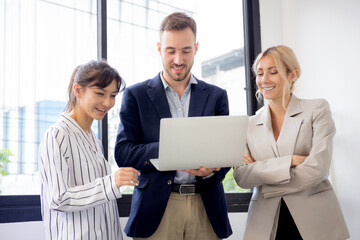 Group of team business people using laptop presentation project with colleagues together for...