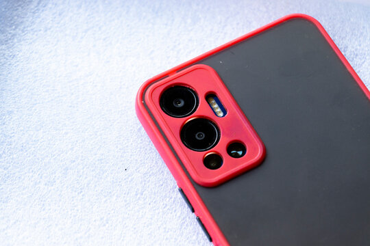 the back of the red smartphone case on a white background
