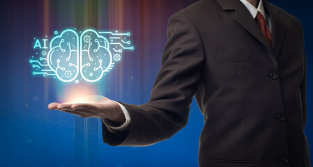 Professional businessman showing virtual brain hologram with Artificial Intelligence (AI),machine deep learning, data mining and modern computer technologies concepts
