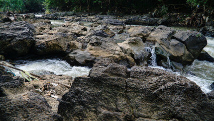 Rocky river with water stream
