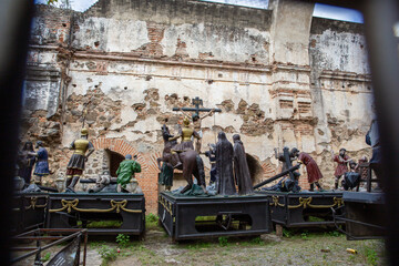 Statues recreate the crucifixion of Christ in church ruins of Antigua, Guatemala.