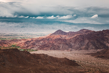 Storm clouds over mountains and valley