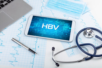 Close-up view of a tablet pc with medical abbreviation