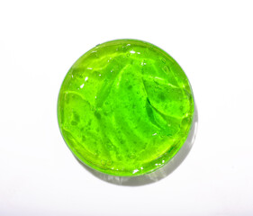 Green gel texture swatches of white background. Close up of aloe vera skin care product like serum, cream, shampoo, moisturiser. 