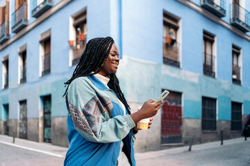 Happy African Girl Using Phone