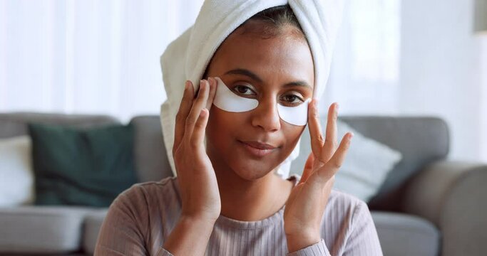 Massage, skincare and girl with eye patch home treatment for face collagen, facial and healthy skin. Beauty, circulation and anti aging cosmetic product routine of indian person for self care.