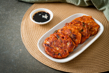 Korean Kimchi pancake or Kimchijeon - Fried Mixed Egg, Kimchi, and Flour