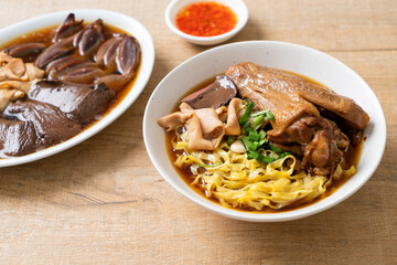 egg noodles with stewed and braised duck in brown soup