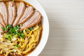 egg noodles with stewed duck in brown soup