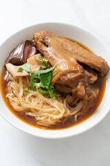 Braised duck noodles with brown soup