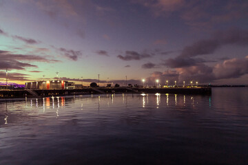 Fototapeta na wymiar Sunset at water front, fish market Auckland city