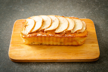 apple loaf crumbled on wood board