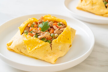 egg wrap or stuffed egg with minced pork and vegetable