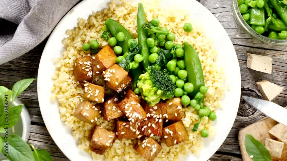 Poster fried tofu with soy sauce, vegetable and semolina