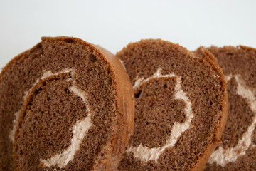 close up chocolate Cake Roll on white background