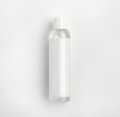 white plastic bottle with liquid