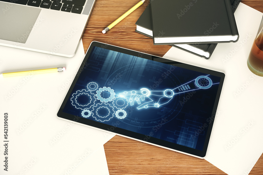 Fototapete top view of modern digital tablet monitor with robotics technology hologram. research and developmen