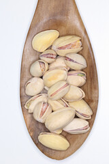 pistachios ready to eat on white background