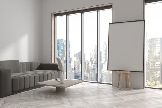 White living room interior with couch near panoramic window. Mockup frame